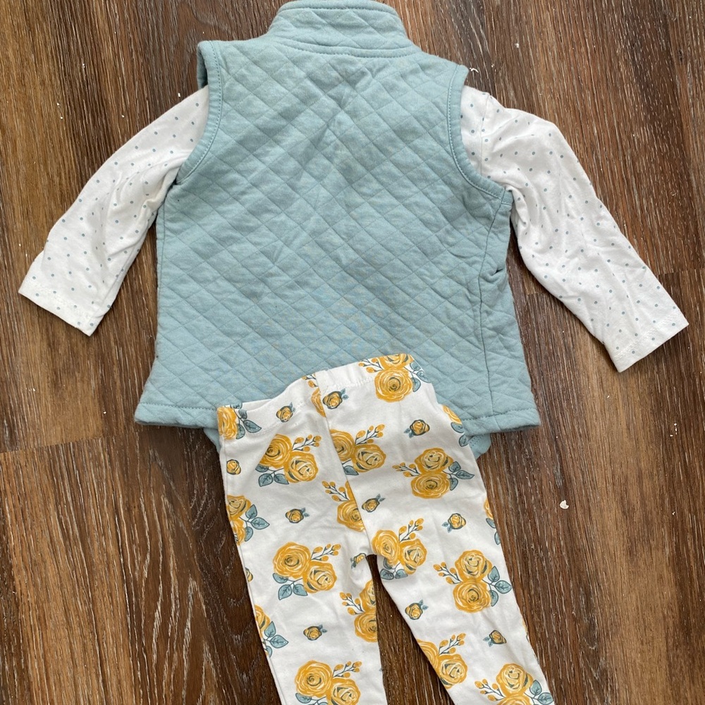 Adorable pants, onesie, and vest outfit